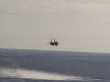 F-14 szuperszónikusan repül