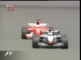F1 2003 Silverstone Barrichello előzi Räikkönent